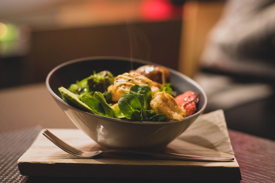 Fresh green salad bowl with vegetables