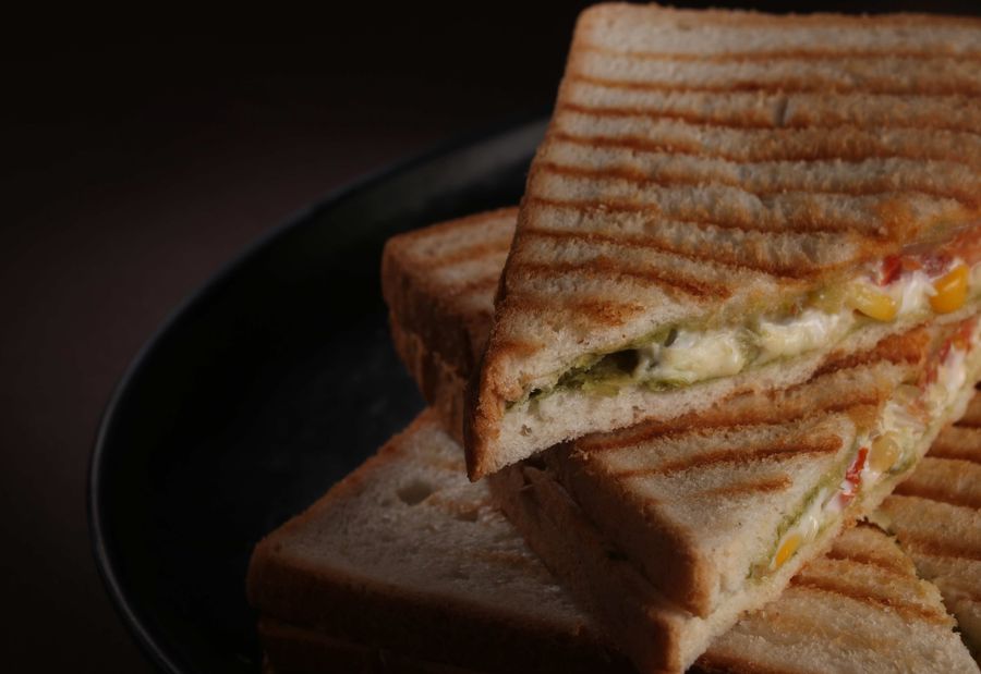 Toasted veggie sandwich with melted cheese and roasted peppers